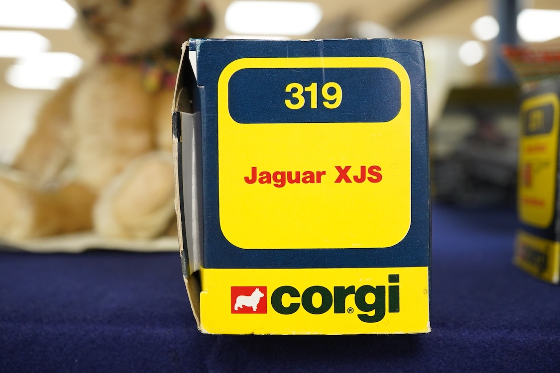 Two boxed 1970s Corgi Toys; a James Bond Aston Martin (261) in silver with passenger, together with a Jaguar XJS (319) in metallic red